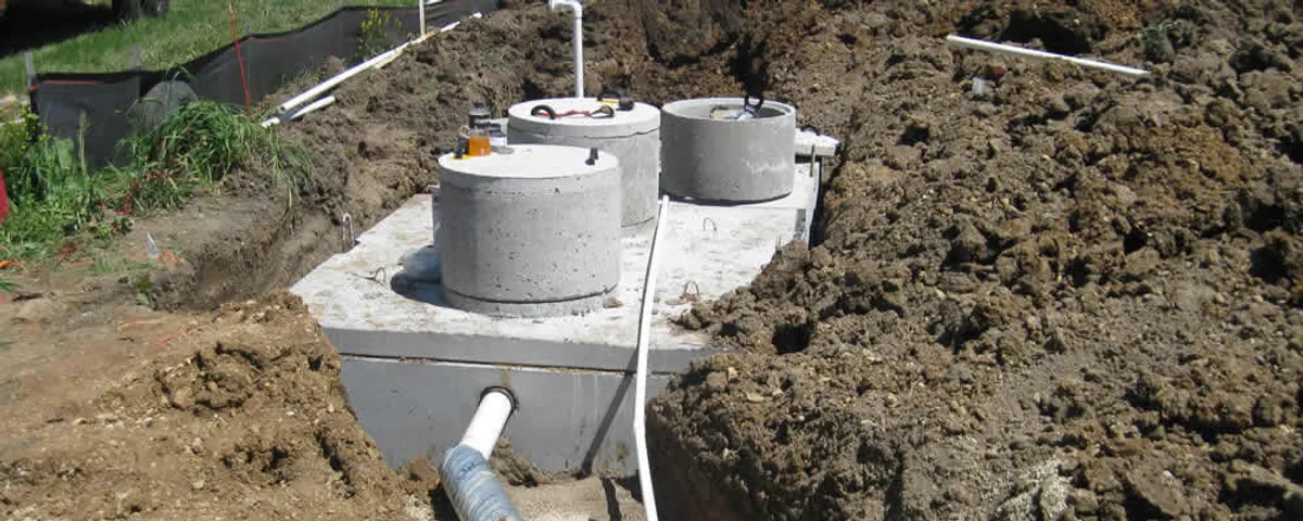 Septic system repair and installation site with tank access ports in Hartford, CT